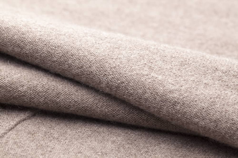 Wool blends are normally used in higher-end clothing, including tweed, chenille, brocade, and velvet.